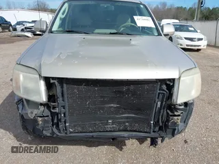 2010 Mercury Mariner Premier with VIN 4M2CN8HG4AKJ05736, listed as a IAAI auction lot 41744987 with 209,819 mi miles and . Bid and sale history available at DreamBid. Image 6.