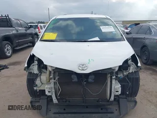 2014 Toyota Sienna LE AAS with VIN 5TDKK3DC6ES526159, listed as a IAAI auction lot 41522210 with 123,563 mi miles and . Bid and sale history available at DreamBid. Image 6.