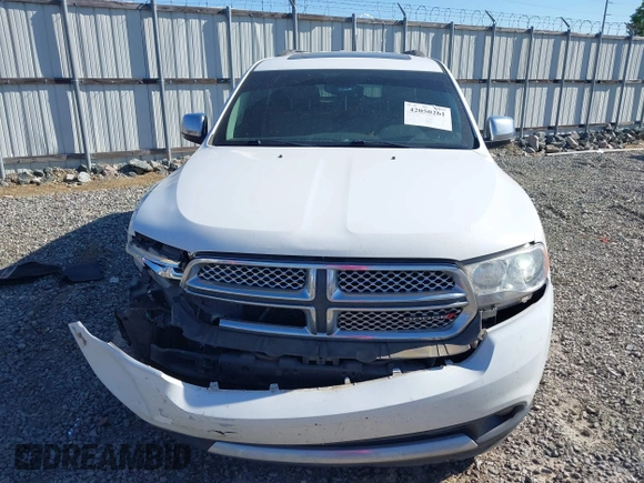 2013 Dodge Durango Citadel with VIN 1C4SDHET0DC571961, listed as a IAAI auction lot 42050261 with 257,637 mi miles and . Bid and sale history available at DreamBid. Image 12.