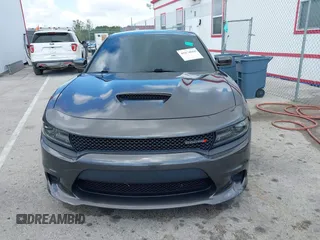 2020 Dodge Charger R/T with VIN 2C3CDXCT8LH229319, listed as a IAAI auction lot 41674868 with 35,814 mi miles and . Bid and sale history available at carsss.com. Image 6.