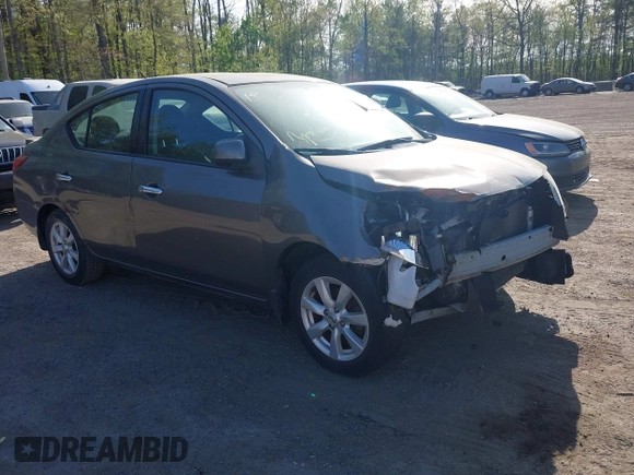 2014 Nissan Versa SV with VIN 3N1CN7AP2EL877539, listed as a IAAI auction lot 42107642 with 122,616 mi miles. Bid and sale history available at carsss.com. Image 1.