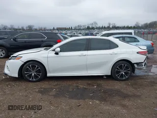 2019 Toyota Camry LE z VIN 4T1B11HK7KU687261, wystawiony jako IAAI lot #42016114 z przebiegiem 123 007 mil mil oraz . Historia ofert i sprzedaży dostępna na DreamBid. Obrazek 14.