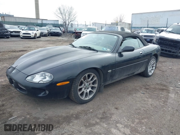 1997 Jaguar XK with VIN SAJGX274XVC017622, listed as a IAAI auction lot 41614339 with 94,298 mi miles and . Bid and sale history available at DreamBid. Image 16.