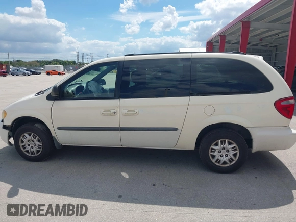 2003 Dodge Grand Caravan with VIN 2D4GP443X3R171373, listed as a IAAI auction lot 41645178 with 163,358 mi miles and . Bid and sale history available at DreamBid. Image 14.