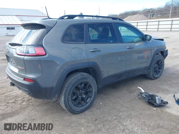 2022 Jeep Cherokee Trailhawk with VIN 1C4PJMBX5ND541929, listed as a IAAI auction lot 41815823 with 68,112 mi miles and . Bid and sale history available at DreamBid. Image 4.