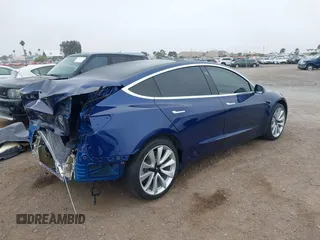 2020 Tesla Model 3 Standard Range Plus with VIN 5YJ3E1EA1LF802648, listed as a IAAI auction lot 42208034 with 27,231 mi miles and . Bid and sale history available at DreamBid. Image 4.