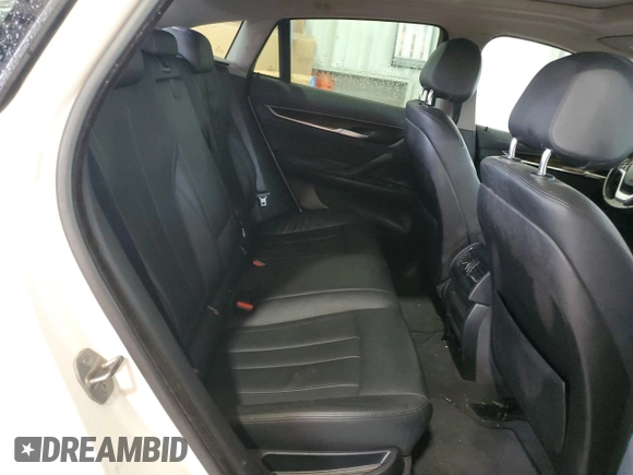 2015 BMW X6 sDrive35i with VIN 5UXKU0C50F0F91865, listed as a Copart auction lot 82128374 with 122,395 mi miles and Salvage Title. Bid and sale history available at carsss.com. Image 10.