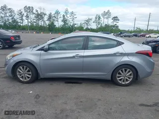 2015 Hyundai Elantra SE with VIN 5NPDH4AE9FH633720, listed as a IAAI auction lot 41983796 with 141,810 mi miles. Bid and sale history available at carsss.com. Image 14.