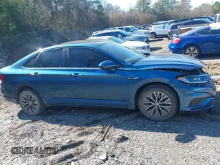 2019 Volkswagen Jetta SEL z VIN 3VWE57BU5KM163658, wystawiony jako IAAI lot #41488007 z przebiegiem 56 026 mil mil oraz . Historia ofert i sprzedaży dostępna na DreamBid. Obrazek 13.