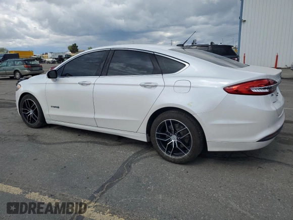 2017 Ford Fusion Hybrid SE with VIN 3FA6P0LU8HR142229, listed as a Copart auction lot 57079925 with 118,629 mi miles and Salvage title. Bid and sale history available at DreamBid. Image 2.