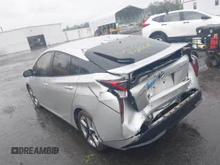 2017 Toyota Prius Two with VIN JTDKARFU4H3043433, listed as a IAAI auction lot 42310201 with 50,715 mi miles and . Bid and sale history available at DreamBid. Image 3.