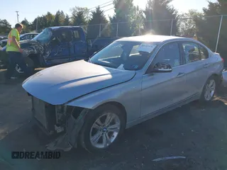 2017 BMW 3 Series 330i with VIN WBA8B9G30HNU57209, listed as a IAAI auction lot 40523376 with 94,338 mi miles. Bid and sale history available at carsss.com. Image 2.