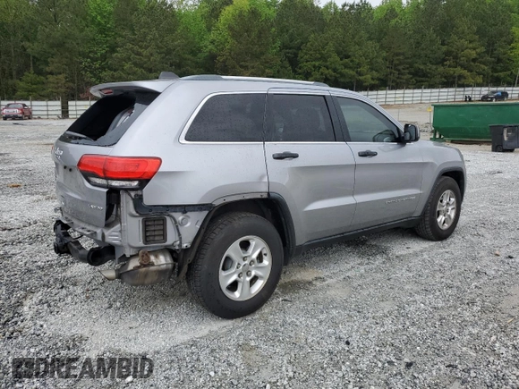 2014 Jeep Grand Cherokee Laredo with VIN 1C4RJEAG2EC179547, listed as a Copart auction lot 53328055 with 107,451 mi miles and Salvage Title. Bid and sale history available at DreamBid. Image 3.