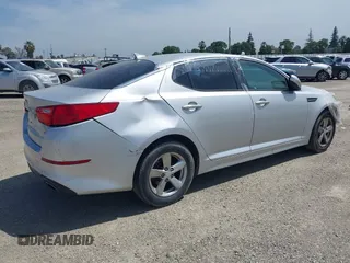 2015 Kia Optima LX with VIN 5XXGM4A74FG381316, listed as a IAAI auction lot 41885940 with 128,984 mi miles. Bid and sale history available at carsss.com. Image 4.