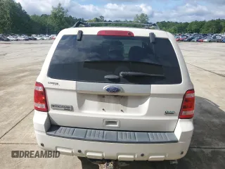 2011 Ford Escape Limited z VIN 1FMCU0EG2BKC70972, wystawiony jako Copart lot #58981605 z przebiegiem 120 117 mil mil oraz Szkoda całkowita • Salvage title. Historia ofert i sprzedaży dostępna na DreamBid. Obrazek 6.