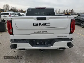 2022 GMC Sierra 1500 with VIN 3GTUUGET7NG527571, listed as a Copart auction lot 84664684 with 43,336 mi miles and Salvage Title. Bid and sale history available at DreamBid. Image 6.