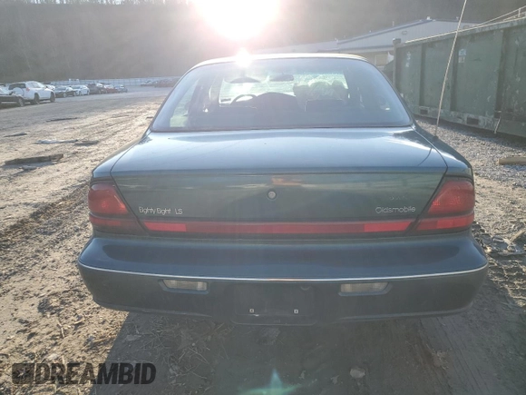 1998 Oldsmobile 88 LS z VIN 1G3HN52K4W4840817, wystawiony jako Copart lot #86803164 z przebiegiem 167 095 mil mil oraz Szkoda całkowita • Salvage title. Historia ofert i sprzedaży dostępna na DreamBid. Obrazek 6.