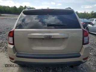 2017 Jeep Compass Sport SE with VIN 1C4NJCBA4HD123119, listed as a Copart auction lot 58787565 with 104,500 mi miles and Salvage title. Bid and sale history available at DreamBid. Image 6.