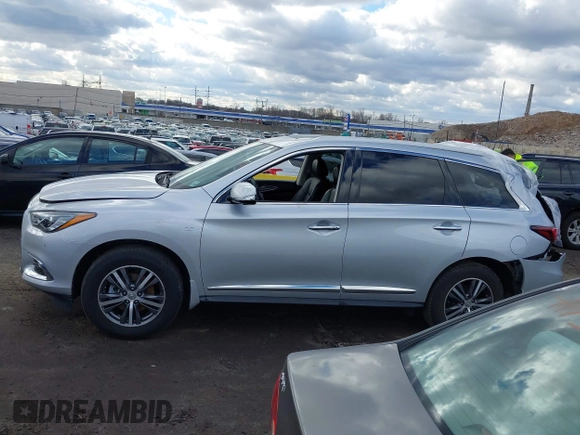 2019 Infiniti QX60 Luxe with VIN 5N1DL0MMXKC554603, listed as a IAAI auction lot 41751072 with 49,654 mi miles and . Bid and sale history available at DreamBid. Image 14.