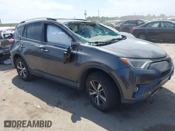 2018 Toyota RAV4 XLE z VIN 2T3WFREV8JW499399, wystawiony jako IAAI lot #42038421 z przebiegiem 77 411 mil mil oraz . Historia ofert i sprzedaży dostępna na DreamBid. Obrazek 1.