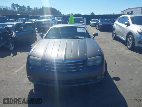 2005 Chrysler Crossfire Limited z VIN 1C3AN69L15X033940, wystawiony jako IAAI lot #41651049 z przebiegiem 88 450 mil mil oraz . Historia ofert i sprzedaży dostępna na DreamBid. Obrazek 12.