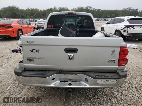 2005 Dodge Dakota Laramie with VIN 1D7HW58N75S100449, listed as a Copart auction lot 86336834 with Not Provided miles and Salvage Title. Bid and sale history available at DreamBid. Image 6.