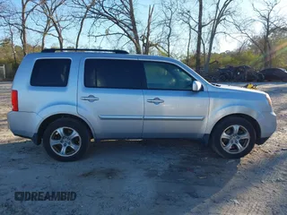 2015 Honda Pilot EX-L with VIN 5FNYF4H57FB006655, listed as a IAAI auction lot 41822385 with 125,915 mi miles and . Bid and sale history available at carsss.com. Image 12.