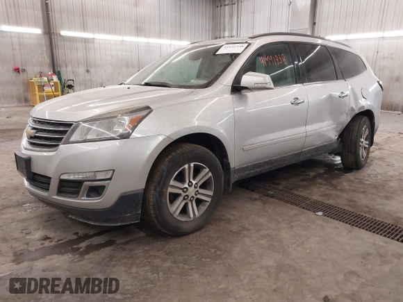 2015 Chevrolet Traverse LT with VIN 1GNKVHKD4FJ305990, listed as a IAAI auction lot 41441938 with 203,877 mi miles and . Bid and sale history available at DreamBid. Image 2.