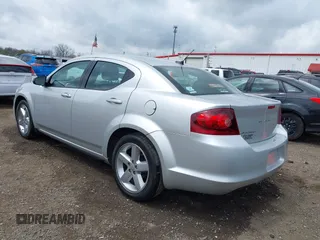 2012 Dodge Avenger SE with VIN 1C3CDZAB3CN324335, listed as a IAAI auction lot 42059158 with 202,417 mi miles. Bid and sale history available at carsss.com. Image 3.