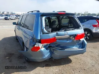 2010 Honda Odyssey Touring with VIN 5FNRL3H92AB056186, listed as a IAAI auction lot 41851386 with 199,109 mi miles. Bid and sale history available at carsss.com. Image 6.