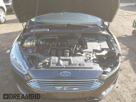2016 Ford Focus SE with VIN 1FADP3F2XGL207906, listed as a IAAI auction lot 42099203 with 95,527 mi miles. Bid and sale history available at carsss.com. Image 10.