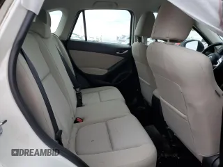 2014 Mazda CX-5 Sport with VIN JM3KE2BE8E0374434, listed as a Copart auction lot 61615445 with 111,330 mi miles and Clean title. Bid and sale history available at DreamBid. Image 10.