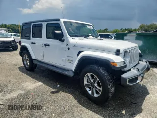 2020 Jeep Wrangler Unlimited Sahara with VIN 1C4HJXEN7LW165137, listed as a Copart auction lot 64458345 with 82,553 mi miles and Salvage title. Bid and sale history available at DreamBid. Image 4.
