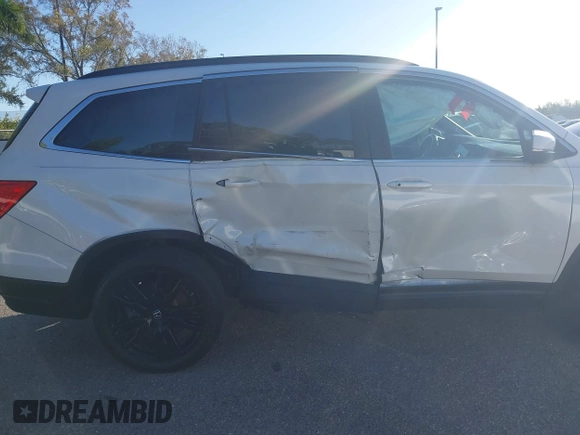 2021 Honda Pilot Special Edition with VIN 5FNYF5H24MB037208, listed as a IAAI auction lot 41319708 with 64,633 mi miles and . Bid and sale history available at DreamBid. Image 17.
