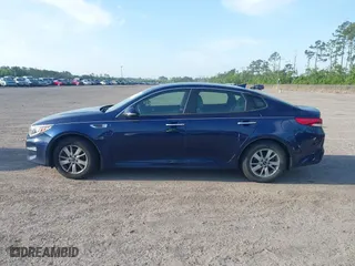 2017 Kia Optima LX with VIN 5XXGT4L35HG174613, listed as a IAAI auction lot 42097790 with 243,335 mi miles. Bid and sale history available at carsss.com. Image 14.