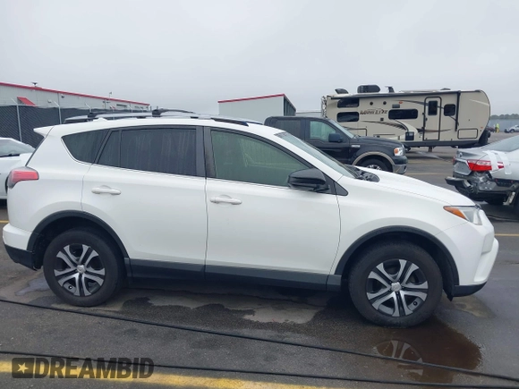 2017 Toyota RAV4 LE with VIN JTMZFREV9HJ704296, listed as a IAAI auction lot 41876996 with 85,605 mi miles and . Bid and sale history available at DreamBid. Image 13.