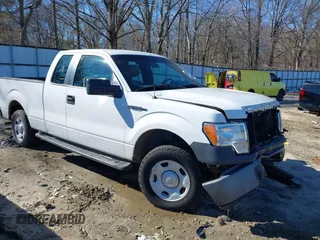 2009 Ford F-150 STX with VIN 1FTRX12W99KB72877, listed as a IAAI auction lot 41341609 with 315,102 mi miles. Bid and sale history available at carsss.com. Image 13.