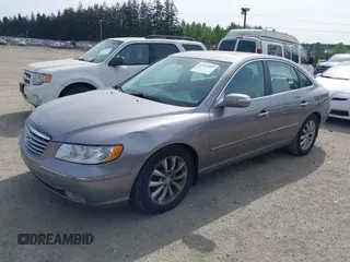 2007 Hyundai Azera SE z VIN KMHFC46F57A141280, wystawiony jako IAAI lot #42214462 z przebiegiem 105 476 mil mil oraz . Historia ofert i sprzedaży dostępna na DreamBid. Obrazek 2.