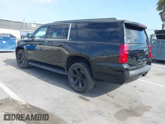 2020 Chevrolet Suburban LT with VIN 1GNSCHKC2LR229759, listed as a IAAI auction lot 42128257 with 46,138 mi miles and . Bid and sale history available at DreamBid. Image 3.