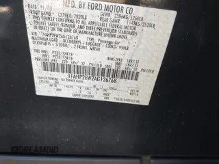 2010 Ford Taurus SEL with VIN 1FAHP2EW2AG126768, listed as a IAAI auction lot 41966591 with 202,733 mi miles and . Bid and sale history available at carsss.com. Image 9.