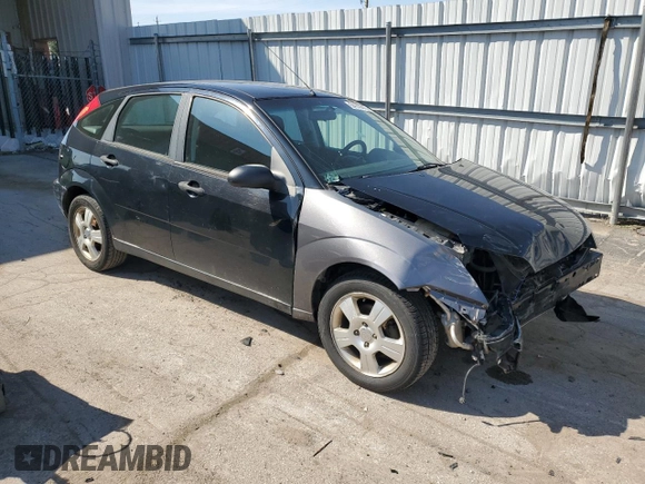 2007 Ford Focus S z VIN 1FAHP37N07W161088, wystawiony jako Copart lot #54140415 z przebiegiem 241 367 mil mil oraz Szkoda całkowita • Salvage title. Historia ofert i sprzedaży dostępna na DreamBid. Obrazek 4.