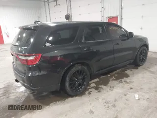 2015 Dodge Durango R/T with VIN 1C4SDJCT4FC888784, listed as a IAAI auction lot 41491247 with 192,206 mi miles and . Bid and sale history available at carsss.com. Image 4.