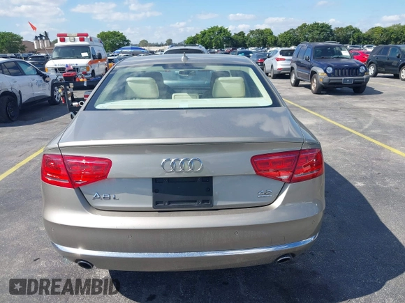 2012 Audi A8 z VIN WAURVAFD0CN001646, wystawiony jako IAAI lot #41524110 z przebiegiem 105 187 mil mil oraz . Historia ofert i sprzedaży dostępna na DreamBid. Obrazek 16.