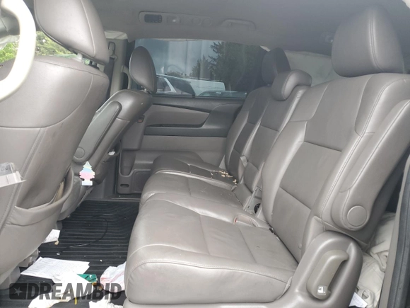 2014 Honda Odyssey Touring with VIN 5FNRL5H95EB056118, listed as a Copart auction lot 57729865 with Not provided miles and Salvage title. Bid and sale history available at DreamBid. Image 11.