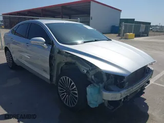 2017 Ford Fusion Energi SE with VIN 3FA6P0PU8HR242177, listed as a IAAI auction lot 42057898 with 119,435 mi miles. Bid and sale history available at carsss.com. Image 1.