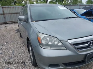2005 Honda Odyssey EX-L z VIN 5FNRL386X5B038143, wystawiony jako IAAI lot #42149398 z przebiegiem 243 002 mil mil oraz . Historia ofert i sprzedaży dostępna na DreamBid. Obrazek 6.