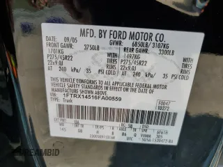 2006 Ford F-150 XLT with VIN 1FTRX14516FA00559, listed as a Copart auction lot 70258584 with 134,791 mi miles and Salvage title. Bid and sale history available at DreamBid. Image 12.
