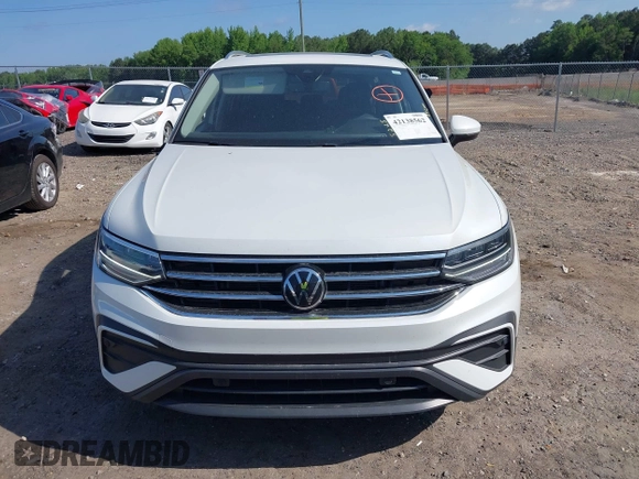 2023 Volkswagen Tiguan SE z VIN 3VVNB7AX9PM121316, wystawiony jako IAAI lot #42138562 z przebiegiem 19 118 mil mil oraz . Historia ofert i sprzedaży dostępna na DreamBid. Obrazek 12.