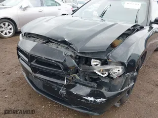 2013 Dodge Charger SXT Plus with VIN 2C3CDXHG1DH620101, listed as a IAAI auction lot 41755409 with 186,939 mi miles. Bid and sale history available at carsss.com. Image 6.