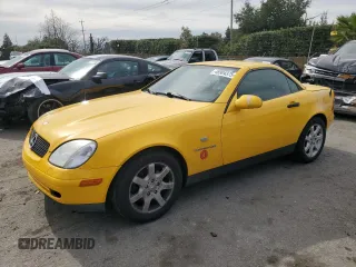2000 Mercedes-Benz SLK-Class Kompressor with VIN WDBKK47FXYF164836, listed as a Copart auction lot 46904375 with 127,424 mi miles and Salvage Title. Bid and sale history available at carsss.com. Image 1.